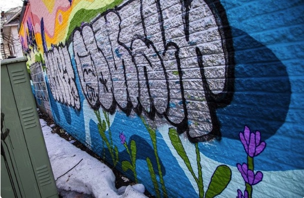 Beloved community mural defaced; three people charged